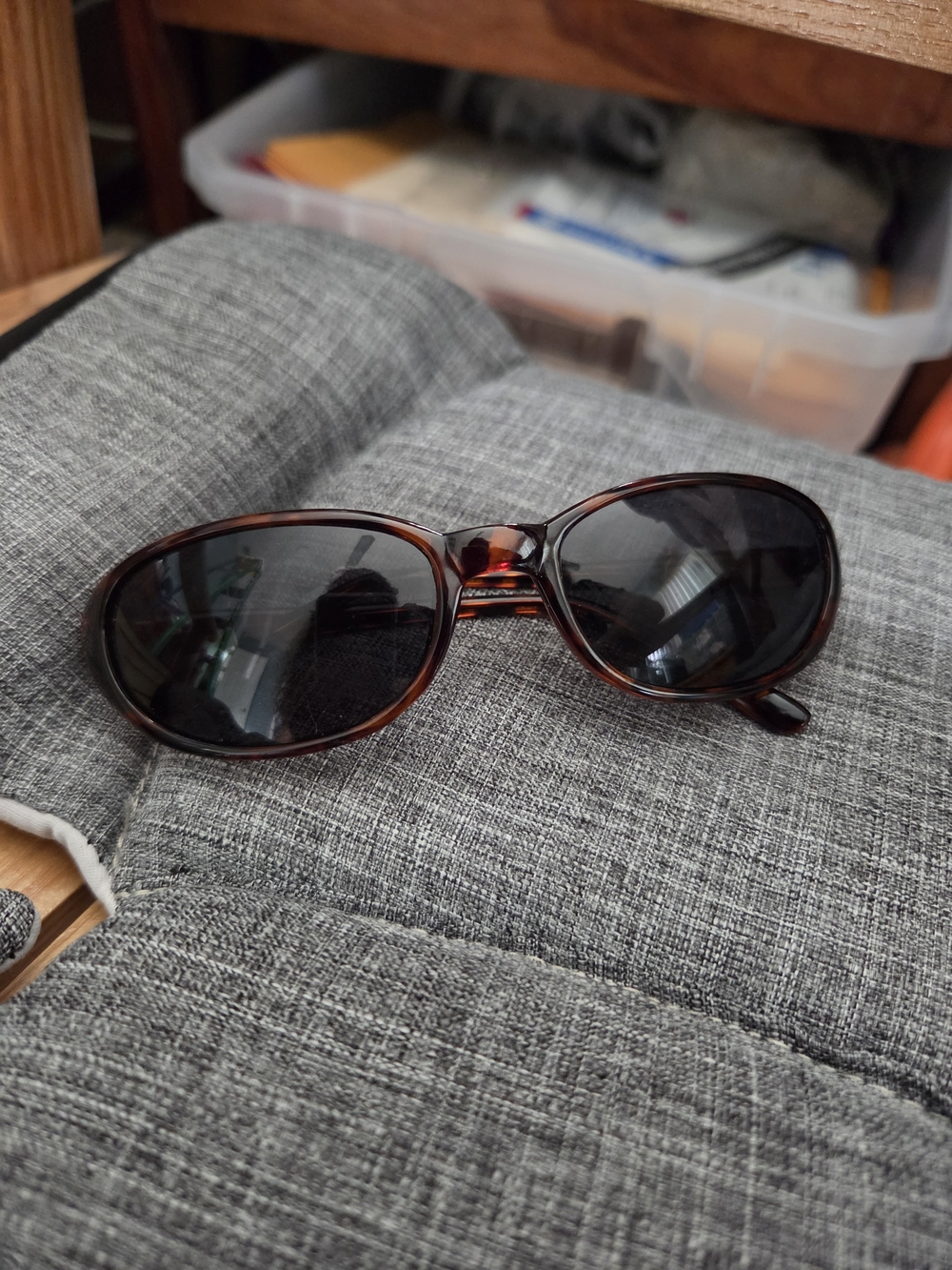 Tortoiseshell Oval Sunglasses with Dark Lenses.  Blue Blocker